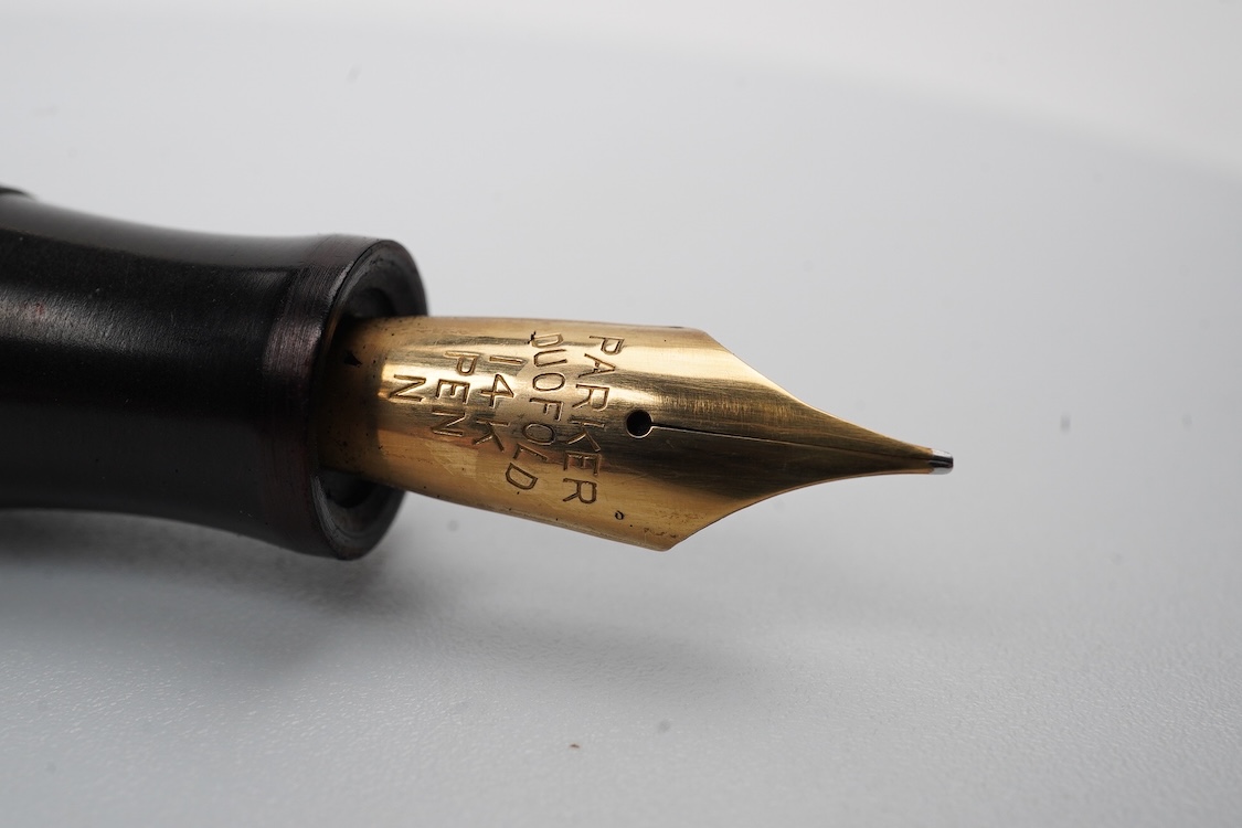 A Parker Senior UK Duofold 'green candy stripe' fountain pen with 14ct. gold 'N' nib